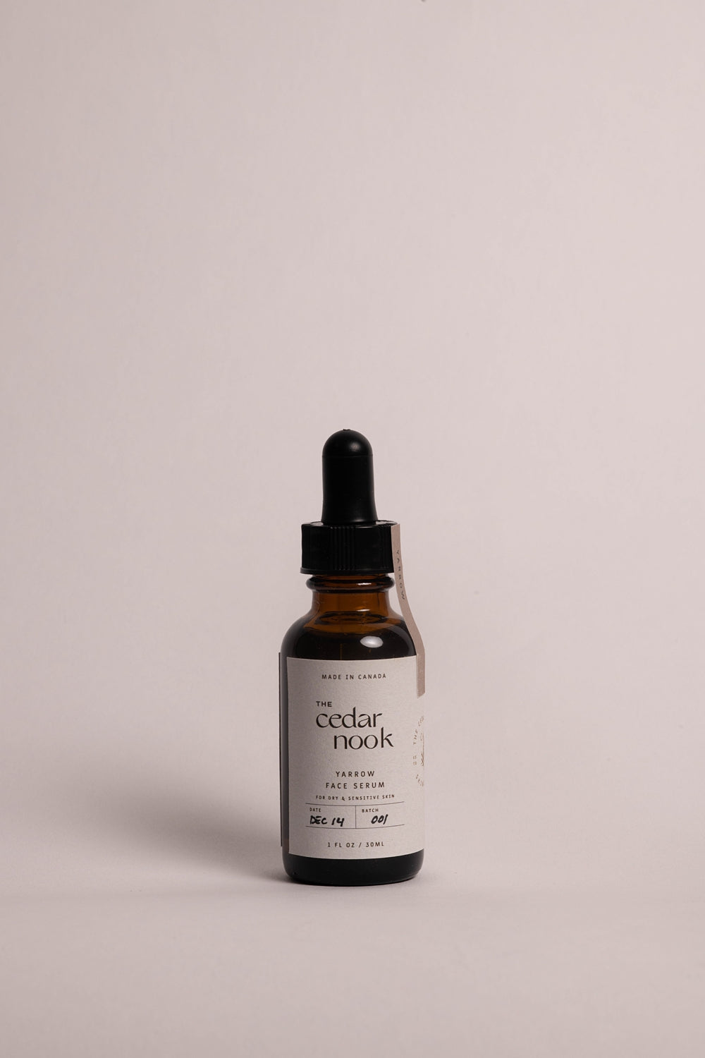 The Cedar Nook | Yarrow Face Serum for dry and sensitive skin,  in our 1 oz amber glass bottle with dropper, white label and forest green logo