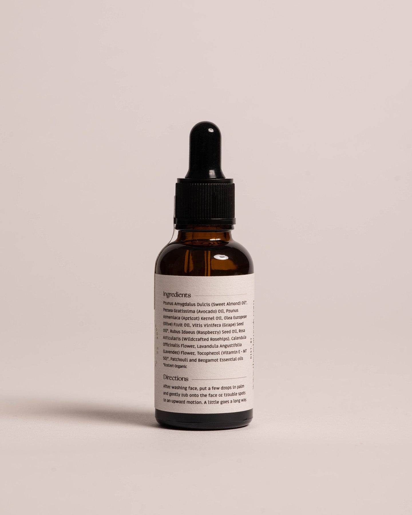 Back view of Rose Hip and Calendula Face Serum, white label with list of ingredients and instructions of use | The Cedar Nook